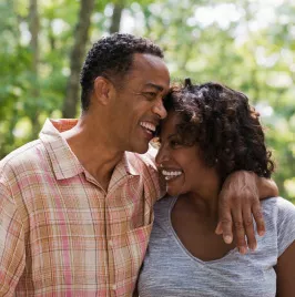 Affectionate couple in woods